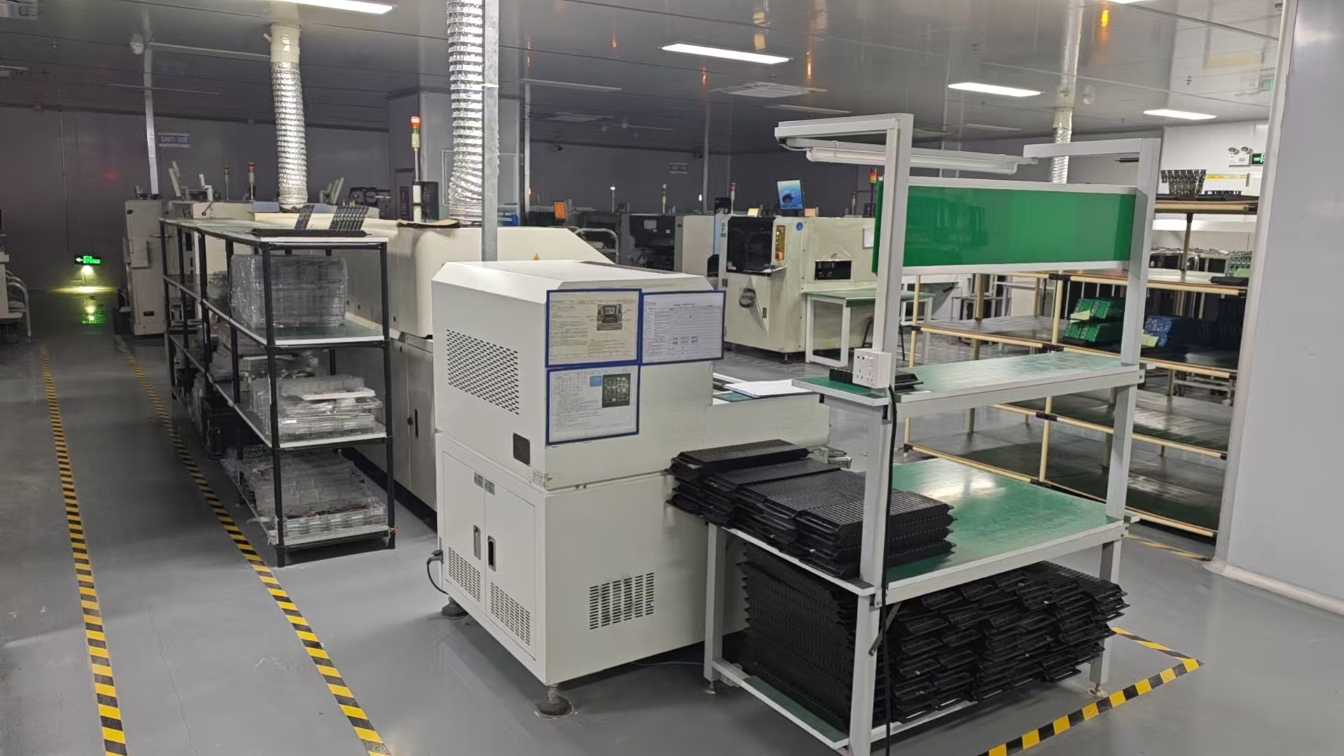 Kwin Electronics manufacturing workshop with production equipment